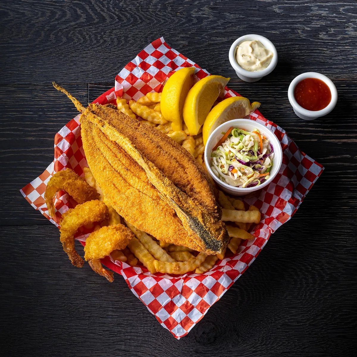 The Big Cat: a whole fried catfish with shrimp, fries and cole slaw